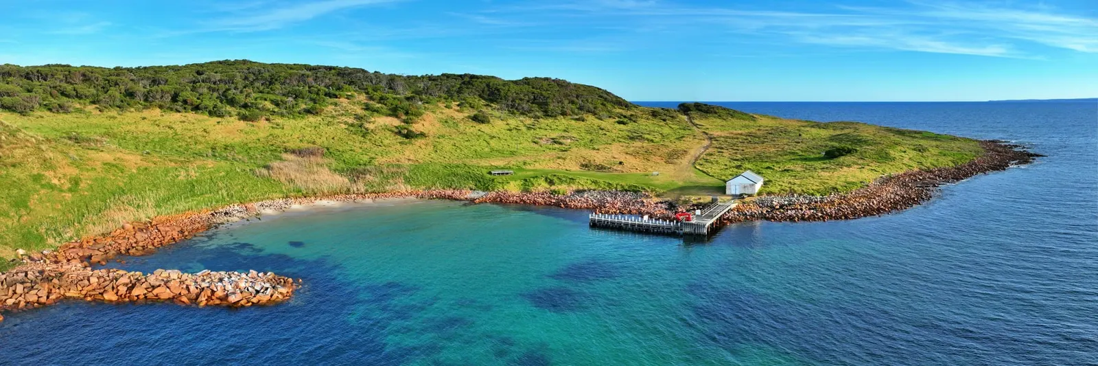 Aerial view of the real Gabo Island coast and harbour